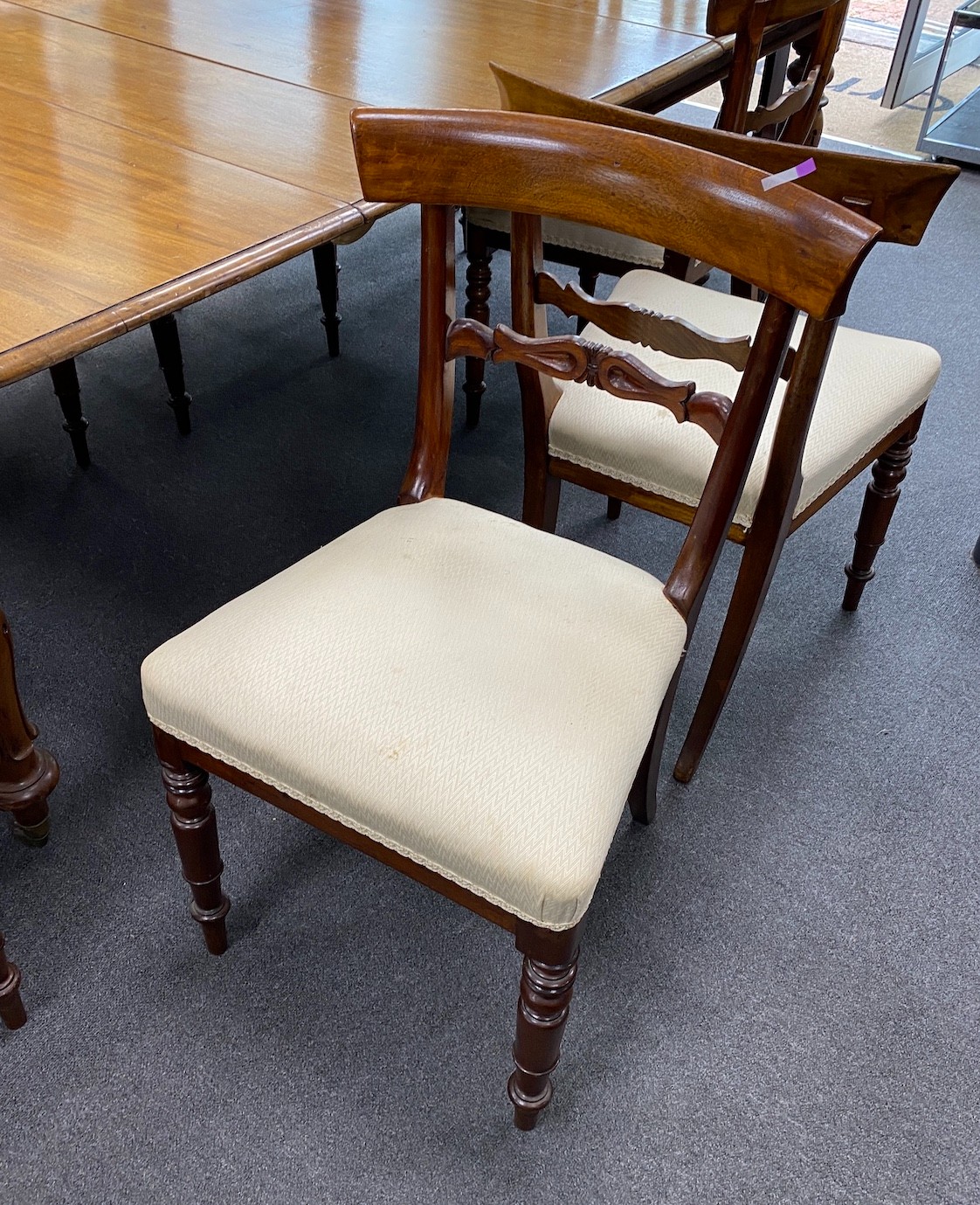 A set of eight Regency mahogany dining chairs (2 carvers)